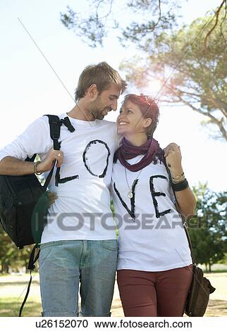 Young couple embracing View Large Photo Image Stock Image - Young couple embracing. Fotosearch