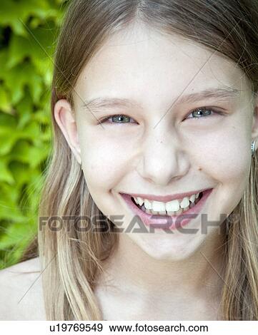 Young girl close-up portrait View Large Photo Image Stock Photo - Young girl close-up portrait. Fotosearch