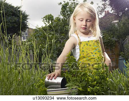 young girl gardening View Large Photo Image Picture - young girl gardening. Fotosearch