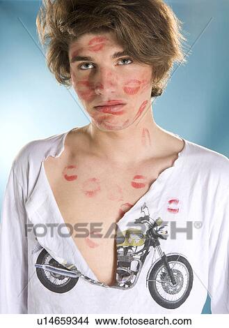 Picture - Young man kiss attack, portrait. Fotosearch