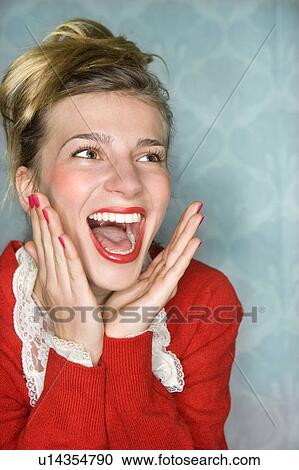 Young woman happy surprise hands up, red View Large Photo Image Stock Image - Young woman happy surprise hands up, red. Fotosearch