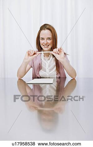 Young woman studying View Large Photo Image Stock Photo - Young woman studying. Fotosearch