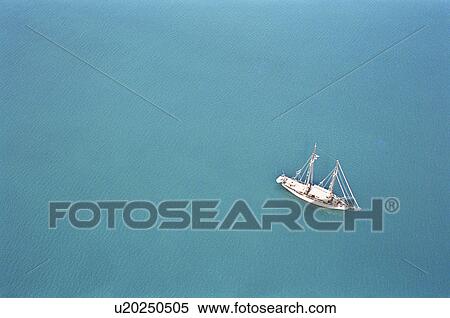 Aerial view of fishing boat on ocean View Large Photo Image Stock Photography - Aerial view of fishing boat on ocean. Fotosearch