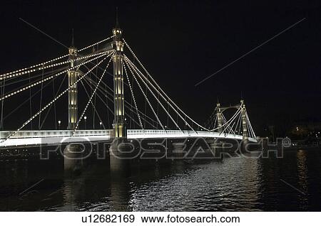 Stock Photo - Albert Bridge lit up at night. Fotosearch