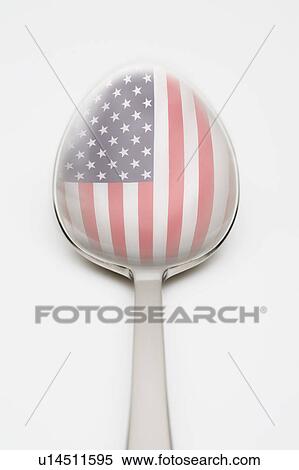 Stock Photography - American flag reflected in spoon. Fotosearch