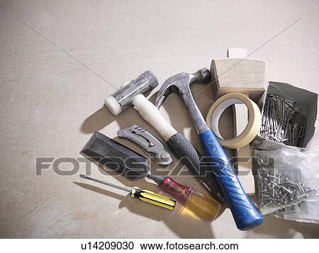 Stock Image - Assorted tools on work surface. Fotosearch