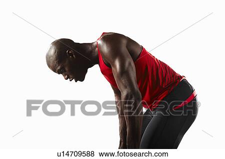 Stock Photo - Athlete resting during exercise. Fotosearch