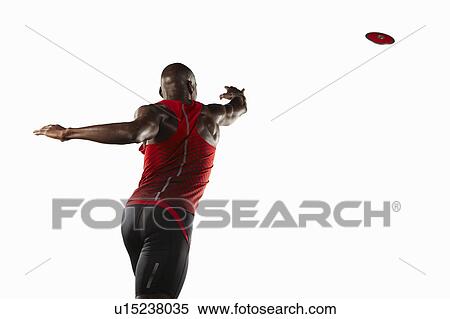 Stock Photography - Athlete throwing discus. Fotosearch
