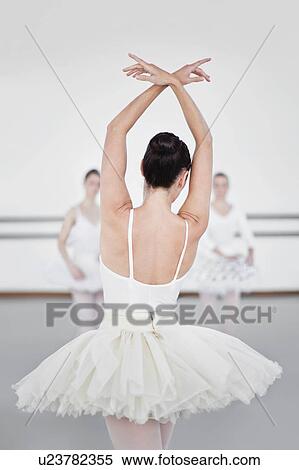 Ballet dancer posing in studio View Large Photo Image Stock Photography - Ballet dancer posing in studio. Fotosearch