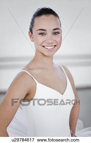 Ballet dancer smiling in studio View Large Photo Image Stock Photo - Ballet dancer smiling in studio. Fotosearch