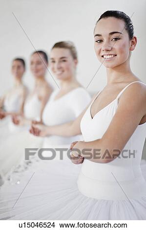 Ballet dancers holding hands in studio View Large Photo Image Picture - Ballet dancers holding hands in studio. Fotosearch