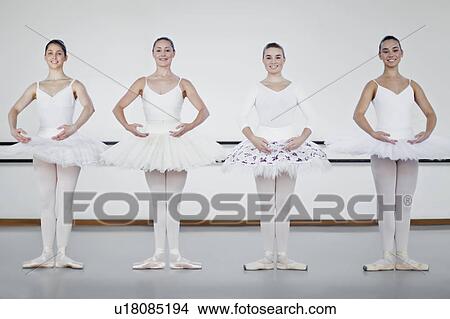 Ballet dancers standing in studio View Large Photo Image Picture - Ballet dancers standing in studio. Fotosearch