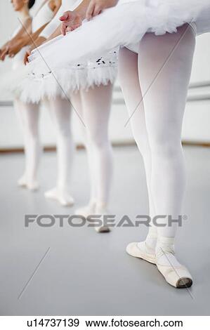 Ballet dancers standing in studio View Large Photo Image Stock Photo - Ballet dancers standing in studio. Fotosearch