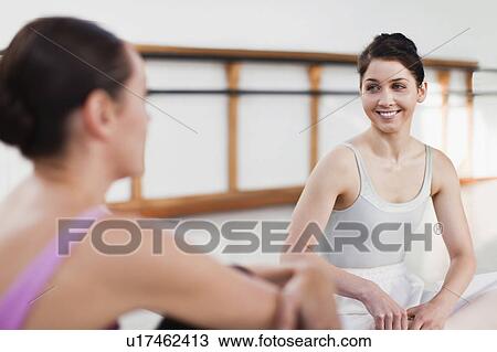 Ballet dancers talking in studio View Large Photo Image Stock Image - Ballet dancers talking in studio. Fotosearch