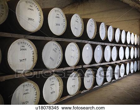 Barrels of whisky in distillery View Large Photo Image Stock Photography - Barrels of whisky in distillery. Fotosearch