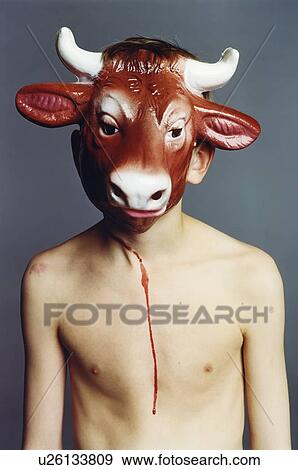 Bleeding boy wearing cow mask View Large Photo Image Stock Photo - Bleeding boy wearing cow mask . Fotosearch