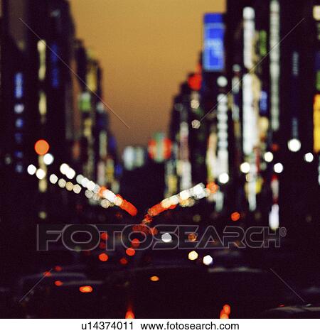 Blurred view of city street View Large Photo Image Stock Image - Blurred view of city street. Fotosearch