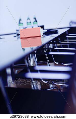 Book on conference table View Large Photo Image Stock Photo - Book on conference table. Fotosearch