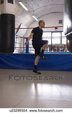 Picture - Boxer jumping rope in gym. Fotosearch