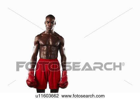 Boxer wearing gloves and shorts View Large Photo Image Stock Image - Boxer wearing gloves and shorts. Fotosearch