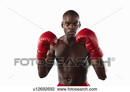 Stock Image - Boxer with fists up. Fotosearch
