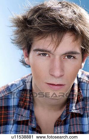 Boy wearing eyebrow piercing View Large Photo Image Stock Image - Boy wearing eyebrow piercing. Fotosearch