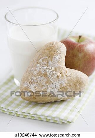 Bread roll and apple with milk View Large Photo Image Picture - Bread roll and apple with milk. Fotosearch