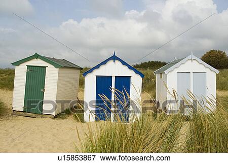 Brightly colored huts on beach View Large Photo Image Stock Photo - Brightly colored huts on beach. Fotosearch
