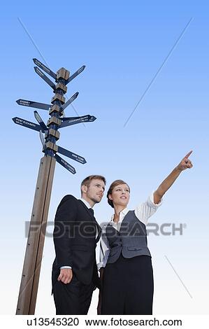 Business people at crossroads View Large Photo Image Stock Image - Business people at crossroads. Fotosearch