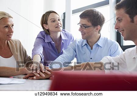 Picture - Business people cheering in conference. Fotosearch