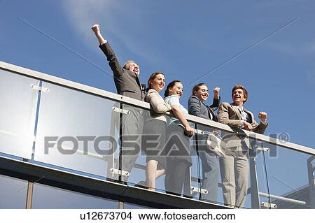 Business people cheering on walkway View Large Photo Image Picture - Business people cheering on walkway. Fotosearch