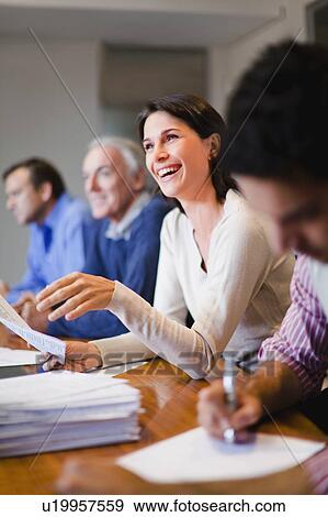 Stock Photo - Business people in meeting. Fotosearch