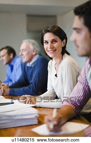 Business people in meeting View Large Photo Image Stock Photography - Business people in meeting. Fotosearch