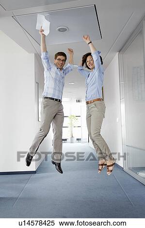 Business people jumping for joy View Large Photo Image Stock Photography - Business people jumping for joy. Fotosearch