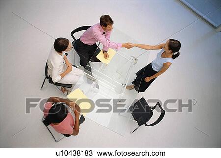 Business people shaking hands in meeting View Large Photo Image Stock Image - Business people shaking hands in meeting. Fotosearch