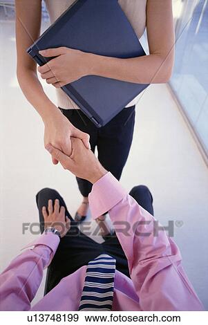 Business people shaking hands View Large Photo Image Stock Photo - Business people shaking hands. Fotosearch