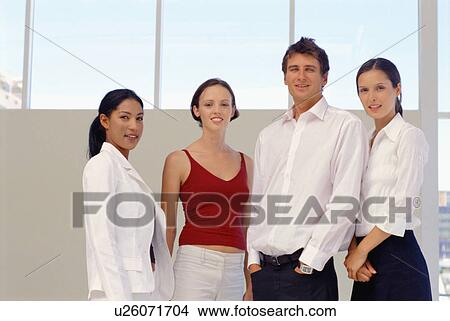 Picture - Business people standing together. Fotosearch