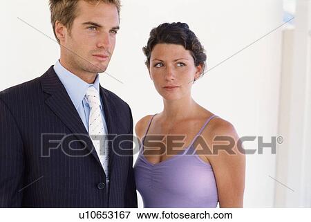 Business people standing together View Large Photo Image Stock Photo - Business people standing together. Fotosearch