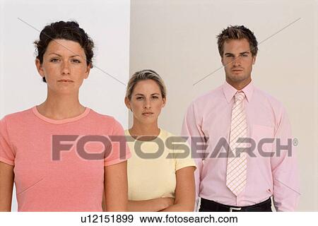 Business people standing together View Large Photo Image Stock Photo - Business people standing together. Fotosearch