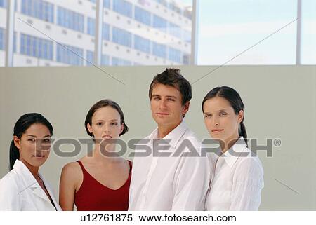 Stock Photography - Business people standing together. Fotosearch