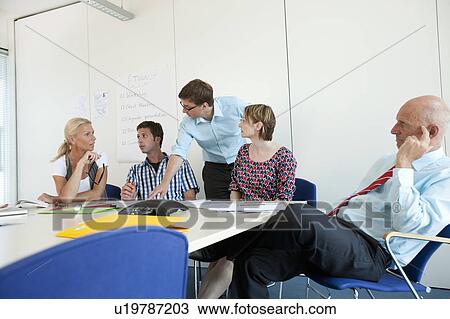 Business people talking in conference View Large Photo Image Stock Image - Business people talking in conference. Fotosearch