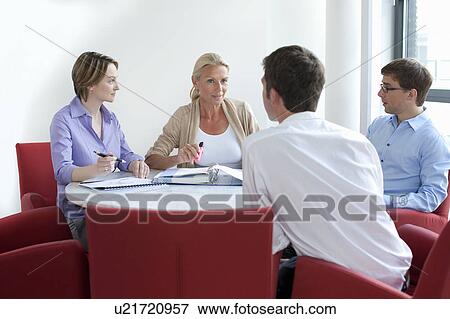 Business people talking in conference View Large Photo Image Stock Photo - Business people talking in conference. Fotosearch