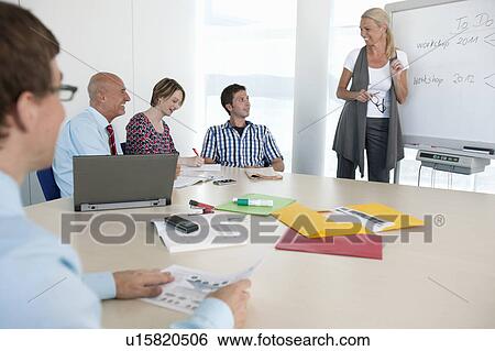 Business people talking in conference View Large Photo Image Stock Photograph - Business people talking in conference. Fotosearch