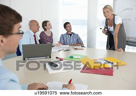 Business people talking in conference View Large Photo Image Stock Photography - Business people talking in conference. Fotosearch