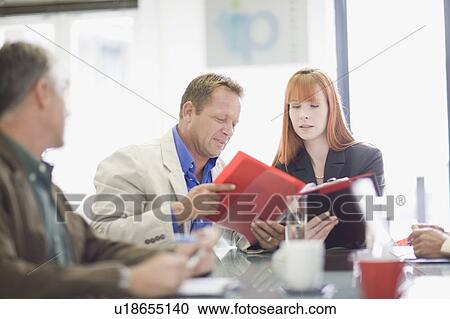 Business people talking in meeting View Large Photo Image Stock Image - Business people talking in meeting. Fotosearch