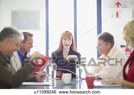 Business people talking in meeting View Large Photo Image Stock Photograph - Business people talking in meeting. Fotosearch