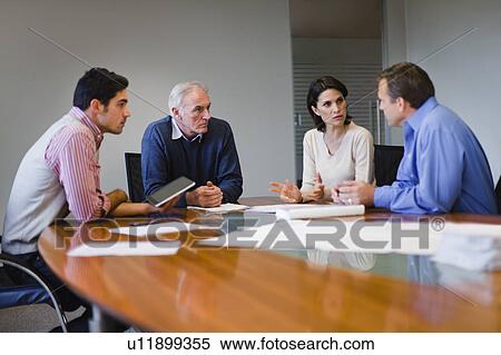 Business people talking in meeting View Large Photo Image Stock Photography - Business people talking in meeting. Fotosearch
