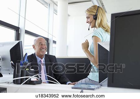 Business people talking in office View Large Photo Image Stock Image - Business people talking in office. Fotosearch