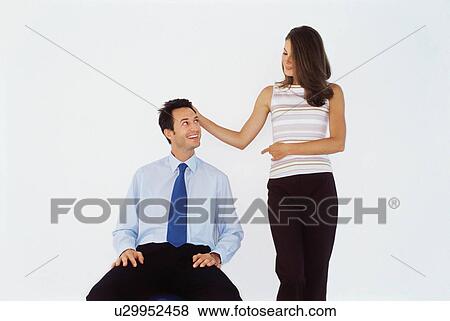 Business people talking in office View Large Photo Image Stock Photo - Business people talking in office. Fotosearch