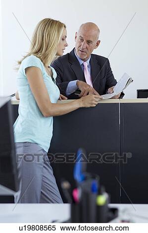 Business people talking in office View Large Photo Image Stock Photography - Business people talking in office. Fotosearch